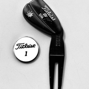 Titleist Golf divot repair tool with ball marker